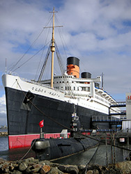 Russian B-427 alongside the Queen Mary by Vic Wild